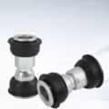 Close-up detail of electric tricycle frame swingarm bolt with durable rubber bushing. - One Size / Printed