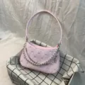 Pink quilted underarm bag with pearl chain detail, elegant women shoulder bag for daily commuting. - Pink