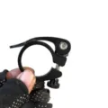Black aluminum alloy bicycle seatpost clamp quick release detail shot for mountain road bikes - 34.9