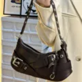 Dark brown motorcycle shoulder bag with buckles and metal eyelet straps for women vintage style. - Coffee