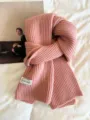 Cozy pink ribbed knit scarf detail, soft winter warm neckerchief for stylish daily wear. - Peach Pink