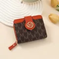 Short PU leather wallet with M monogram print, orange trim, card slots and coin pocket. - Brown