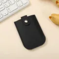 Black leather card holder with snap button closure, compact minimalist credit card case. - Black