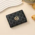 Women's black tri-fold wallet featuring stylish monogram letter print and a gold metal M logo clasp. - 11*1.5*8cm / Black