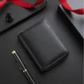 Black leather short zipper wallet and coin purse with pebbled texture, compact card holder. - Black