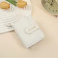 Portafoglio corto da donna bianco in ecopelle con motivo litchi, zip e scomparti per carte. - Bianco