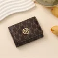 Stylish women's trifold wallet in dark brown with monogram print and metal M logo clasp. - 11*1.5*8cm / Dark Brown