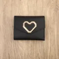 Black short wallet for women, stylish geometric heart buckle, compact trifold coin purse design. - Black