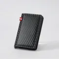 Men's minimalist carbon fiber card holder wallet with money clip and RFID blocking pop-up slots. - Black