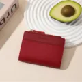 Red short wallet for women, solid color minimalist design with zipper and card slots. - Red
