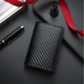 Black carbon fiber RFID blocking pop up card wallet for men minimalist slim design. - Black