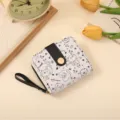 Cute cartoon cat print short wallet with zipper, card slots and wrist strap for women. - Black