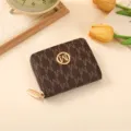 Stylish brown short wallet for women with monogram print, compact design and secure zipper. - Dark Brown