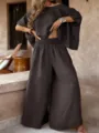 Detail shot of casual solid color loose round neck off-shoulder summer women two piece outfit. - S / Top And Bottom / Coffee