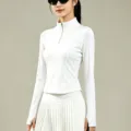 Top de sport côtelé blanc à demi-zip et jupe plissée taille haute variante de sport. - S / Hauts / Blanc