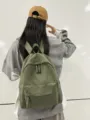 Einfarbiger Canvas Rucksack für Damen, lässige Pendler Schultasche, stilvoller Reiserucksack. - Grün