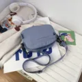 Bolso cruzado de nailon casual para hombre y mujer, bolso de hombro minimalista. - Azul