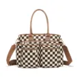 Black and white checkerboard tote bag with brown handles, multiple zip pockets, and strap. - Brown