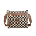Detailed view of the stylish checkered crossbody shoulder bag with brown leather trim and tassel. - Brown