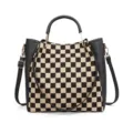 Stylish black and white checkerboard handbag with leather trim and shoulder strap. - Black