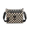 Black and white checkerboard canvas crossbody bag with wide strap, zipper pocket and tassels. - Black
