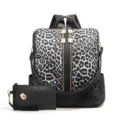 Black and white leopard print backpack detail showcasing double zippers and matching wristlet. - Leopard Print Black