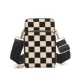 Black and white checkerboard crossbody phone bag with adjustable strap and metal hardware. - Black