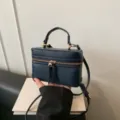 Classic navy blue vintage vanity box bag with top handle and chic tassel zipper design for women. - Blue PU Style