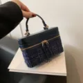 Classic navy tweed vanity handbag with chic metal zipper and elegant top handle design. - Blue Tweed Style