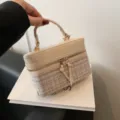 Elegant tweed vanity bag with top handle and gold zipper, stylish retro cosmetic box handbag. - Beige Tweed Style