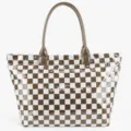 Brown and white checkerboard tote bag detail showing glossy PVC texture and double handles. - Khaki