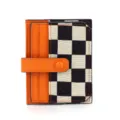 Compact checkered canvas card holder with orange leather snap closure for daily use by women. - Orange