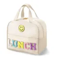 Insulated lunch bag with cute smiley face patch and colorful LUNCH letters for daily meals. - Off White