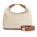 Woven straw handbag detail showing stylish brown leather handle, metal buckle, and crossbody strap. - Off White