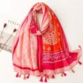 Detailed view of the vintage paisley print cotton linen scarf with elegant tassel hem. - Red Series 11