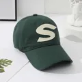 Dark green cotton baseball cap with bold white letter S patch for casual outdoor sun protection - Dark Green