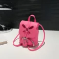 Chic sac à dos rose pour femme, sac de jour en cuir PU décontracté avec joli design papillon. - Rose