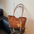Vintage large capacity brown leather shoulder tote bag for women, daily commute bags - With Pendant / Brown