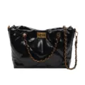 Schwarze gesteppte Damentasche, elegante Handtasche aus Leder mit goldener Kette. - Schwarz