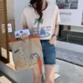 Vue détaillée du sac cabas en toile tendance avec sangle contrastée et broderie. - Motif OK Sun - Kaki