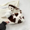Fluffy cow print shoulder bag with cute plush pendant, soft underarm crossbody bag for women. - With Charm / Cow Print