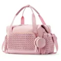 Grande borsa fasciatoio da viaggio rosa con tasca intrecciata e comodo astuccio tondo. - Rosa