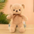 Primo piano di un morbido orsetto di peluche marrone con grazioso fiocco e pelliccia fine. - 40CM / Marrone scuro