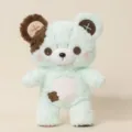 Dettaglio di orsacchiotto in peluche verde menta carino con occhi a bottone e toppe morbide. - Verde chiaro