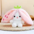 Grazioso peluche coniglio frutta trasformabile dettaglio primo piano con copertura rosa e zip. - Coniglio Pesca