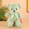 Cute light green plush teddy bear with ribbon bow, soft stuffed toy doll for kids and home decor. - Sea Green