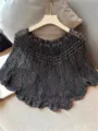 Close-up detail showcasing the delicate hollow-out texture of the colorful knitted cape. - Iridescent Black
