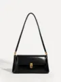 Black leather baguette shoulder bag detail featuring elegant gold tone metal clasp closure. - Black (PU)