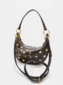 Vintage brown crescent shoulder bag with gold rivets, stylish faux leather underarm handbag for women. - S / Coffee