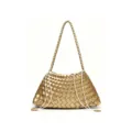 Gold woven leather handbag detail, featuring intricate intrecciato pattern and stylish strap. - Gold